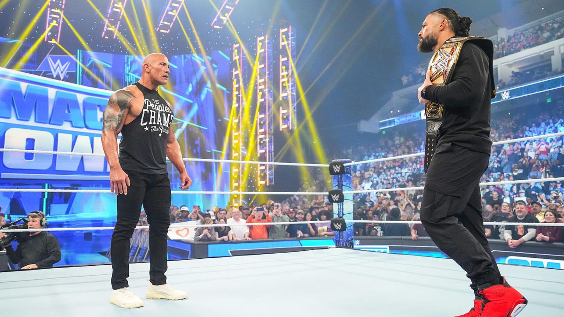 The Rock (left) and Roman Reigns (right) faced off last week on SmackDown.